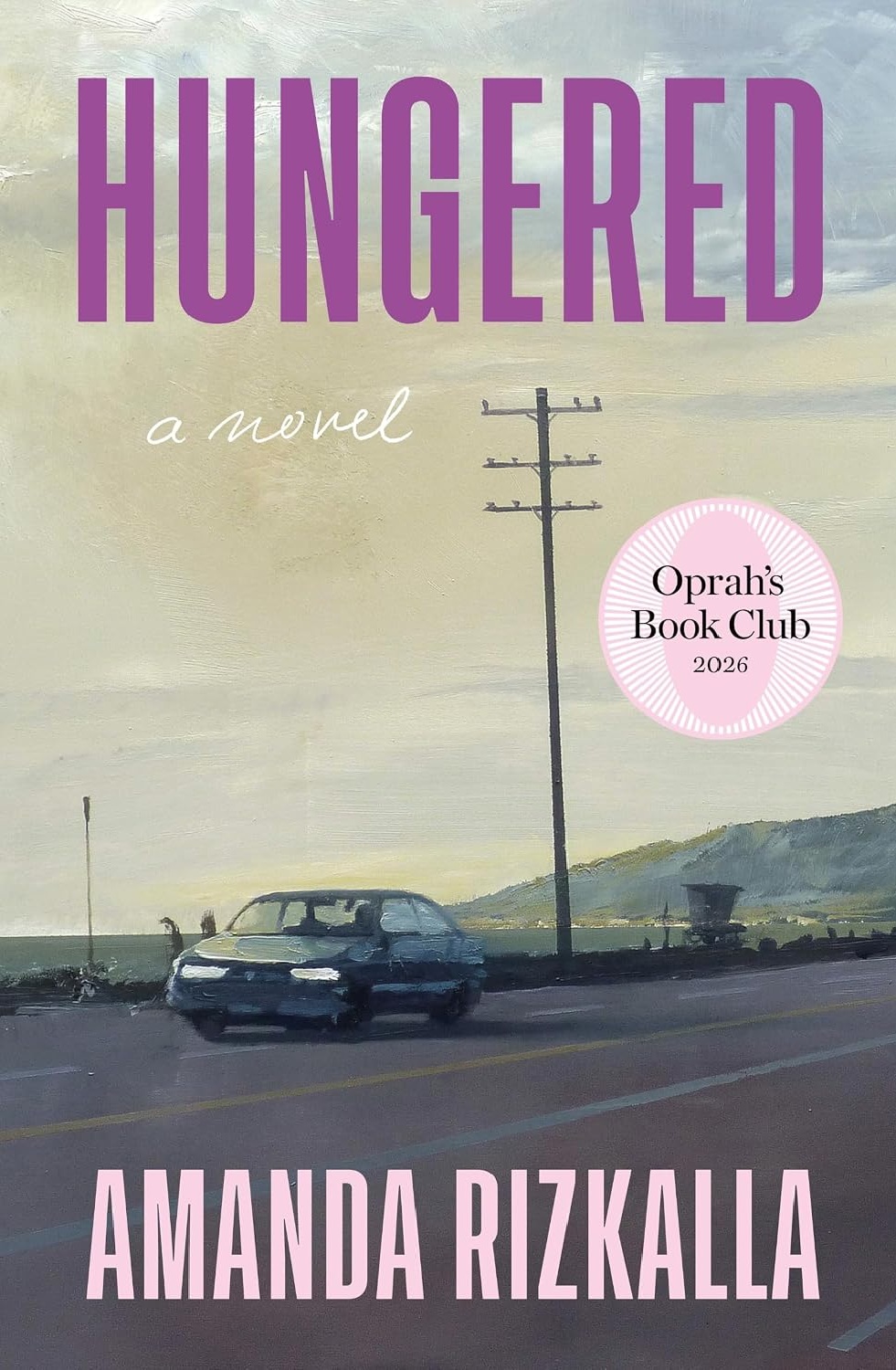 Book cover for Hungered by Amanda Rizkalla, featuring a painting of a car on a coastal road and an Oprahs Book Club 2026 seal.